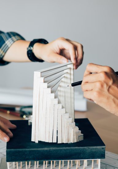 architect-reviewing-architectural-model-in-the-off-2023-11-27-05-14-08-utcResized.jpg